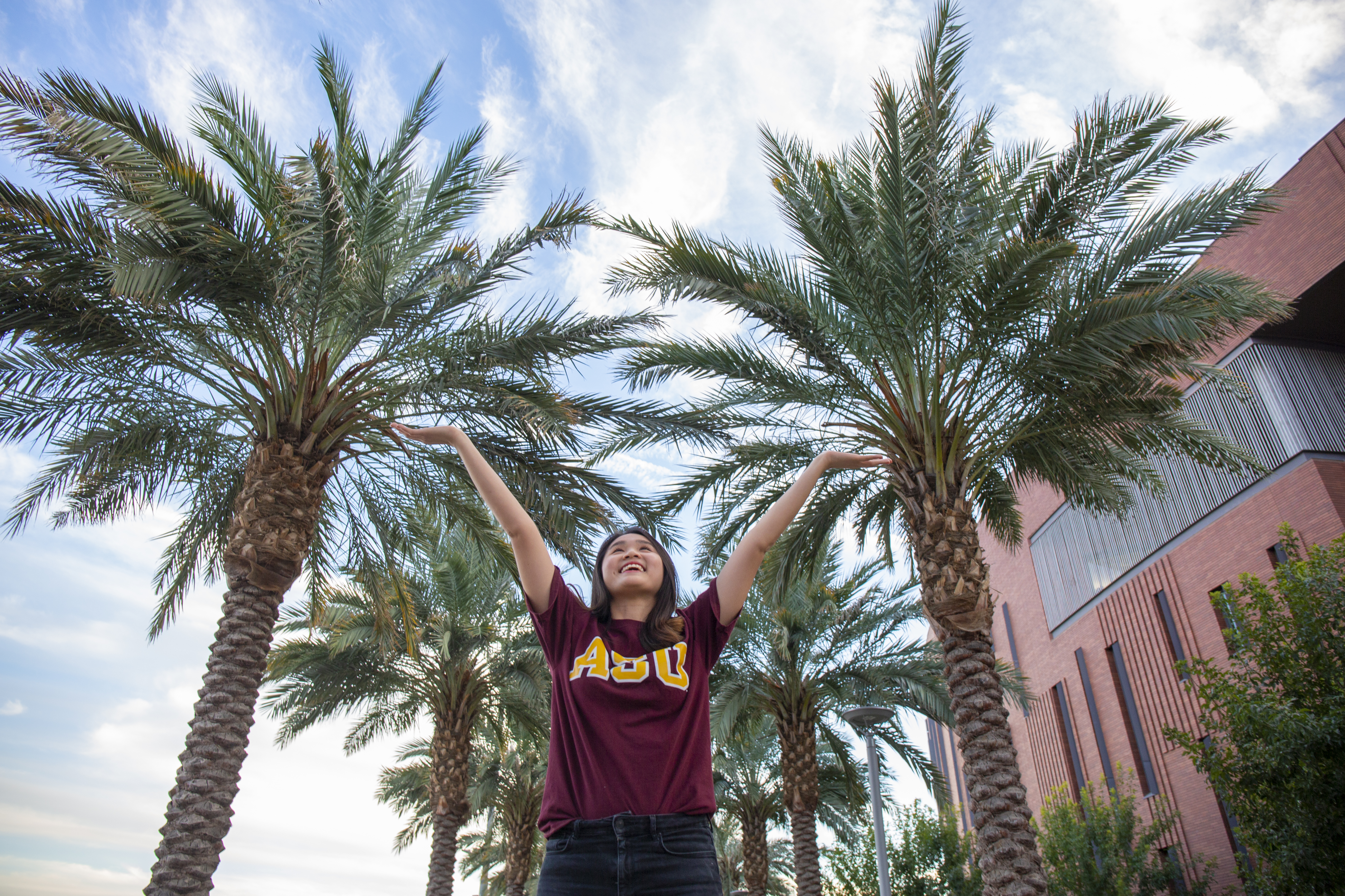 ASU student poses at Tempe campus Palm Walk
